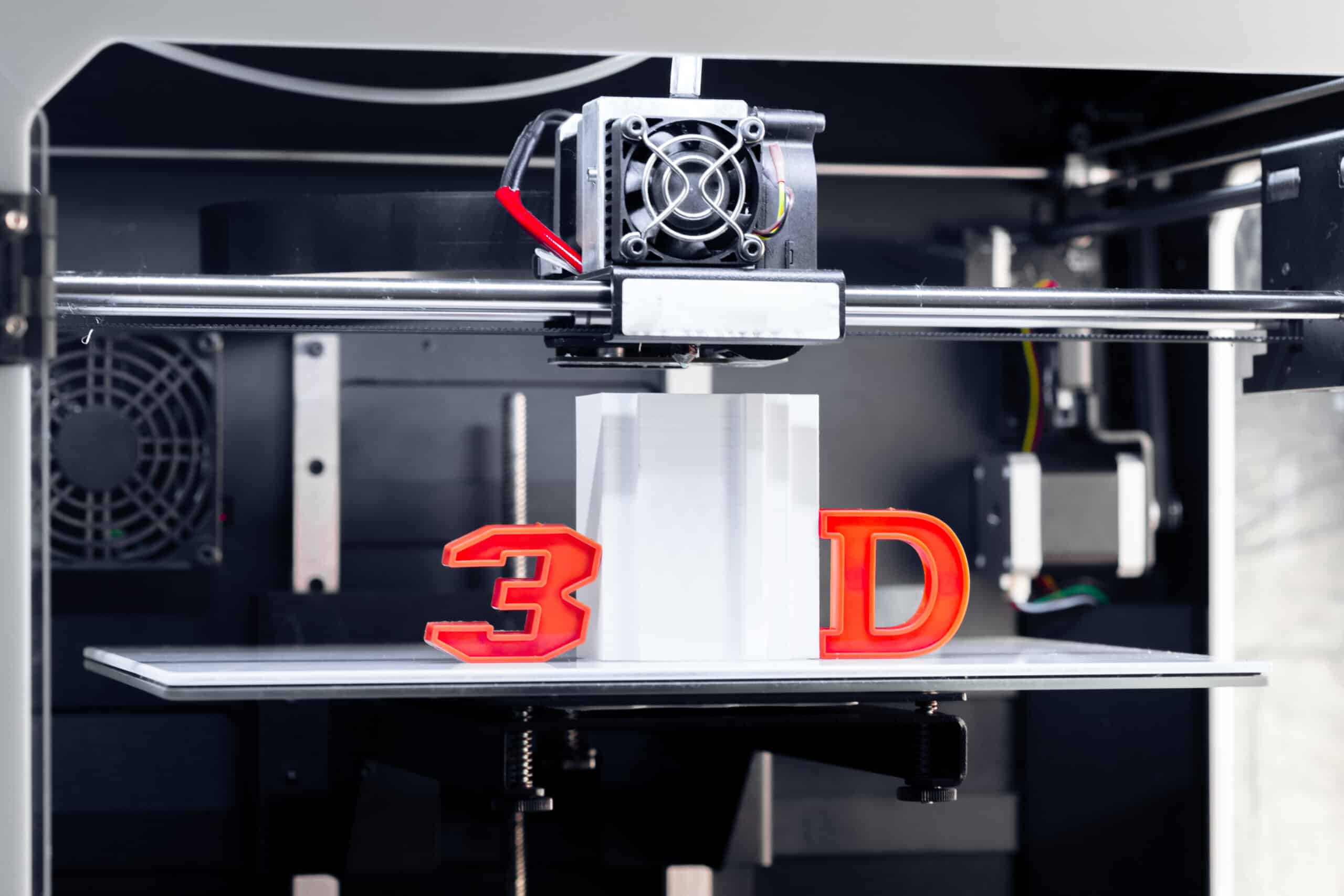 White 3D printed piece showing visible layer lines