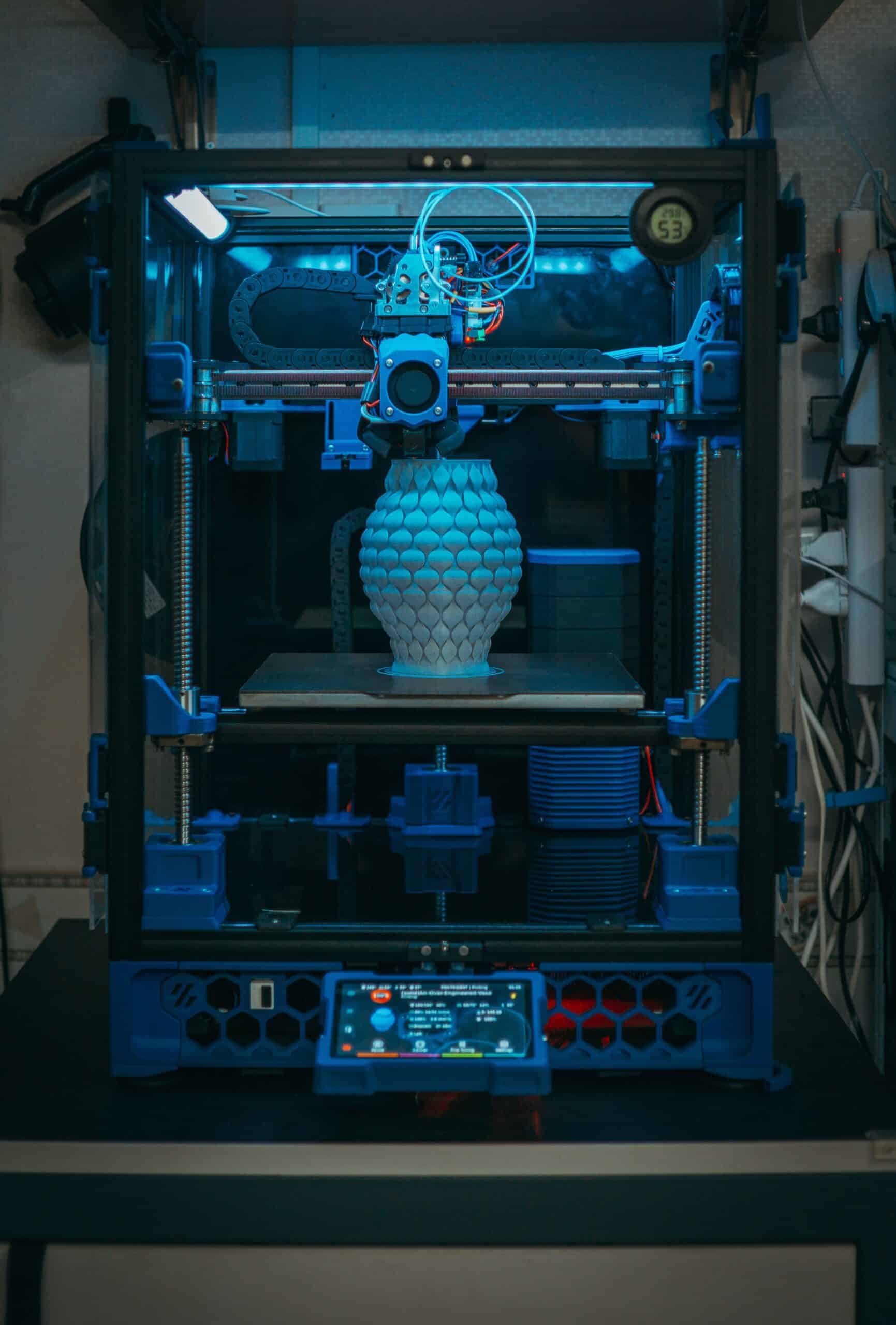 Close-up of a 3D printer in action, crafting a detailed vase in a modern setting