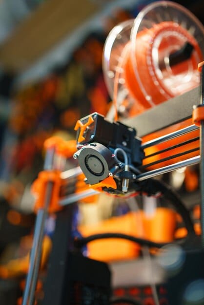 Close-up of a 3D printer extruder and nozzle, the part responsible for nozzle dragging marks when travel clearance is too low